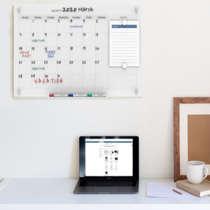 Wall Mounted Calendar Glass dry Erase board in a home office. 